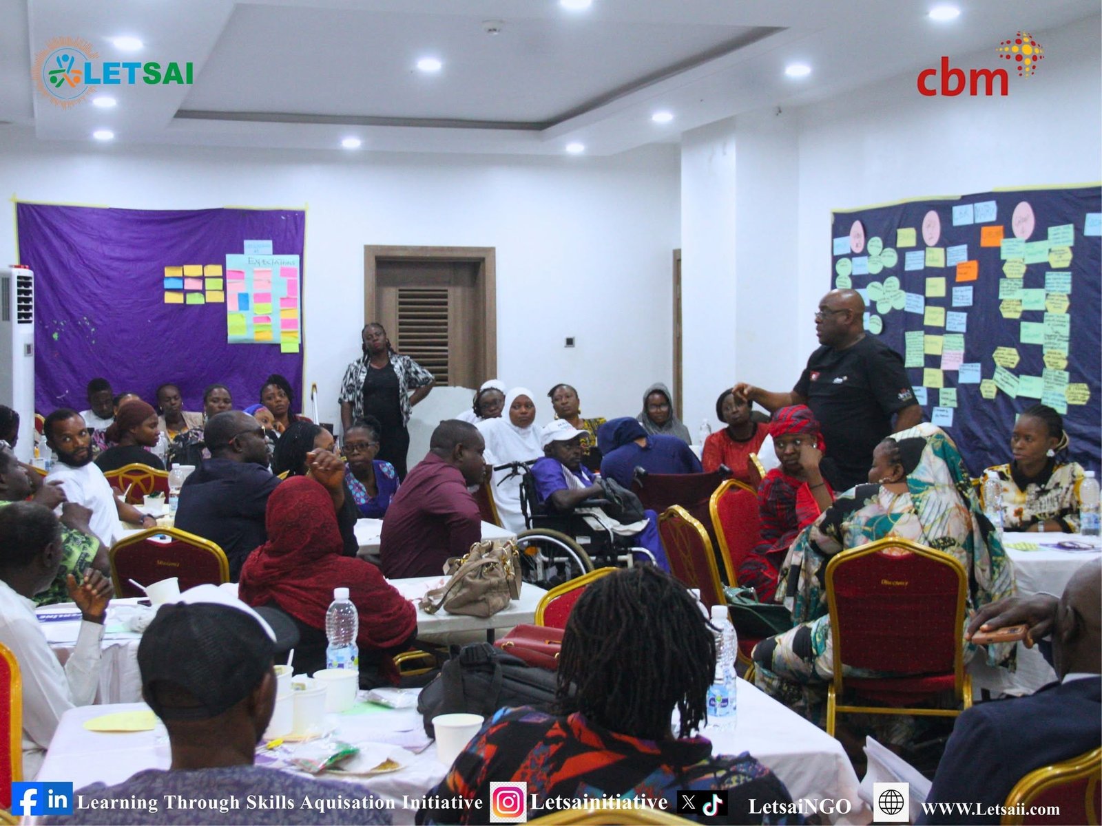 Wheelchair users and other participants in a LETSAI disability-inclusion workshop